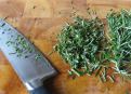 What to do to reduce clutter formed during chopping herbs.