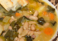 white bean soup with ham, pumpkin, and chard